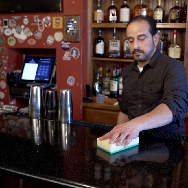 XL Scrubber and Sponge being used on a bar