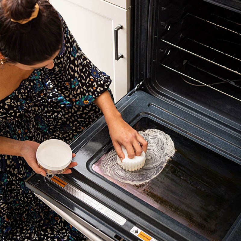 Cleaning an oven door with PowerPaste and a Dye-Free Scrub Mommy
